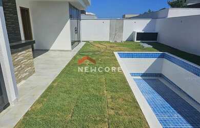 Imagem: A casa possui 3 Dormitórios, 4 Banheiros, 2 Vagas na garagem