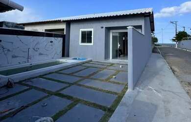 Imagem: A casa possui 2 Dormitórios, 1 Banheiro, 1 Vaga na garagem