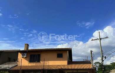 Imagem: A casa possui 3 Dormitórios, 2 Banheiros, 3 Vagas na garagem