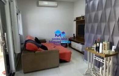 Imagem: A casa possui 3 Dormitórios, 2 Banheiros, 3 Vagas na garagem