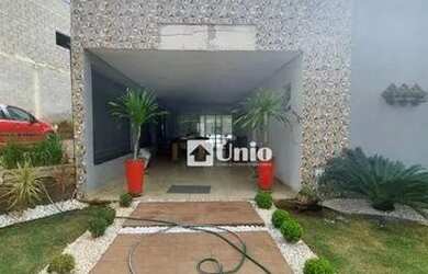 Imagem: A casa possui 3 Dormitórios, 4 Banheiros, 4 Vagas na garagem