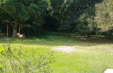 Imagem: A casa possui 5 Dormitórios, 5 Banheiros, 5 Vagas na garagem