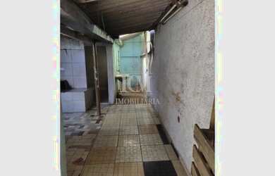 Imagem: A casa possui 3 Dormitórios, 2 Banheiros, 4 Vagas na garagem