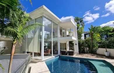 Imagem: A casa em condomínio possui 4 Dormitórios, 5 Banheiros, 4