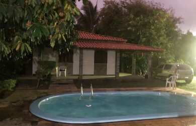 Imagem: A casa possui 3 Dormitórios, 3 Banheiros, 5 Vagas na garagem