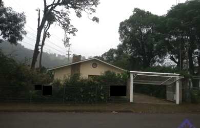 Imagem: A casa possui 3 Dormitórios, 4 Banheiros, 217m² de Área e