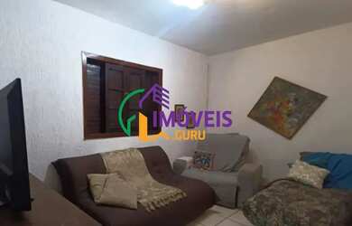 Imagem: A casa possui 2 Dormitórios, 2 Banheiros, 2 Vagas na garagem