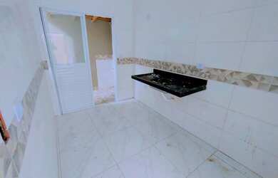 Imagem: A casa possui 2 Dormitórios, 1 Banheiro, 1 Vaga na garagem