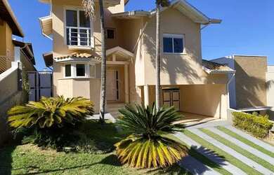 Imagem: A casa possui 3 Dormitórios, 5 Banheiros, 4 Vagas na garagem