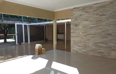 Imagem: A casa possui 5 Dormitórios, 4 Banheiros, 3 Vagas na garagem