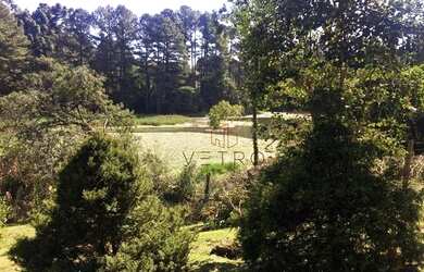 Imagem: A casa possui 3 Dormitórios, 1 Banheiro, 3 Vagas na garagem