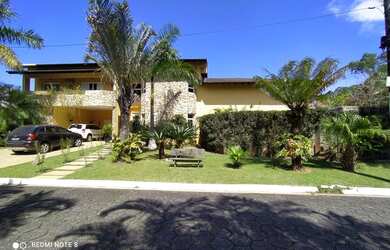 Imagem: A casa possui 5 Dormitórios, 5 Banheiros, 5 Vagas na garagem