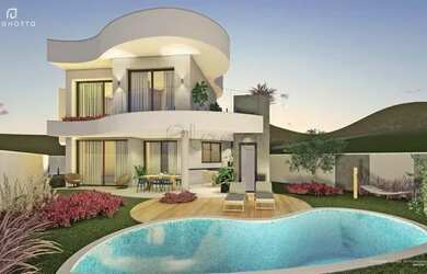 Imagem: A casa possui 3 Dormitórios, 5 Banheiros, 4 Vagas na garagem