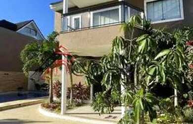 Imagem: A casa em condomínio possui 5 Dormitórios, 5 Banheiros, 2