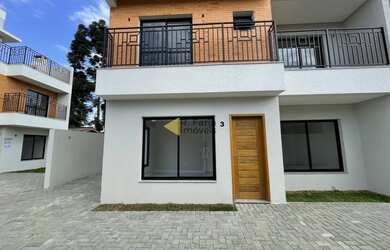 Imagem: A casa possui 3 Dormitórios, 3 Banheiros, 2 Vagas na garagem