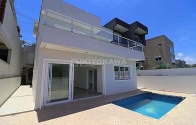 Imagem: A casa possui 4 Dormitórios, 5 Banheiros, 5 Vagas na garagem