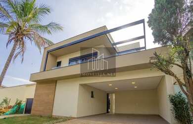 Imagem: A casa possui 3 Dormitórios, 4 Banheiros, 4 Vagas na garagem