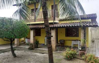Imagem: A casa possui 3 Dormitórios, 3 Banheiros, 3 Vagas na garagem