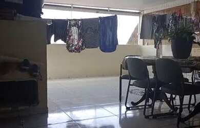 Imagem: A casa possui 3 Dormitórios e 2 Banheiros e está localizado