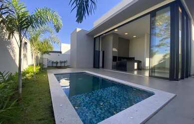 Imagem: A casa possui 3 Dormitórios, 4 Banheiros, 4 Vagas na garagem