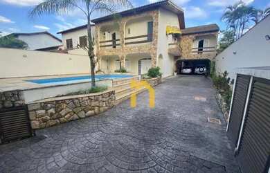 Imagem: A casa em condomínio possui 5 Dormitórios, 5 Banheiros, 5