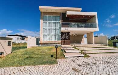 Imagem: A casa em condomínio possui 4 Dormitórios, 5 Banheiros, 4