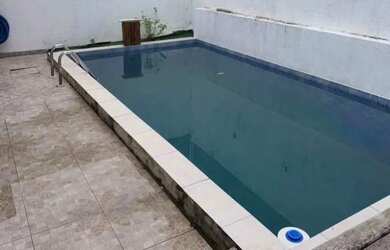 Imagem: A casa possui 3 Dormitórios, 2 Banheiros, 1 Vaga na garagem