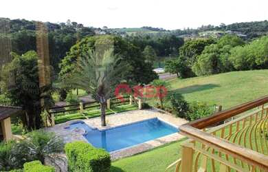 Imagem: A casa em condomínio possui 4 Dormitórios, 3 Banheiros, 5