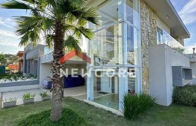 Imagem: A casa possui 5 Dormitórios, 5 Banheiros, 5 Vagas na garagem