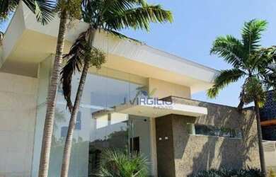 Imagem: A casa em condomínio possui 4 Dormitórios, 5 Banheiros, 5