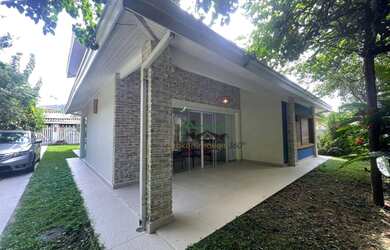 Imagem: A casa possui 4 Dormitórios, 5 Banheiros, 260m² de Área e