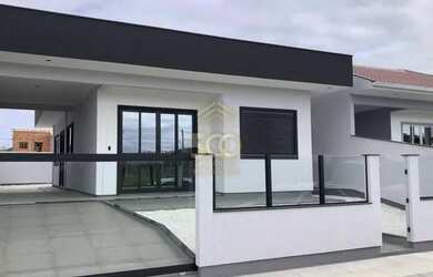 Imagem: A casa possui 3 Dormitórios, 1 Banheiro, 2 Vagas na garagem