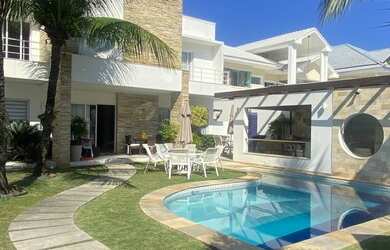 Imagem: A casa em condomínio possui 4 Dormitórios, 5 Banheiros, 5