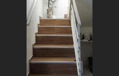 Imagem: A casa possui 4 Dormitórios, 3 Banheiros, 3 Vagas na garagem