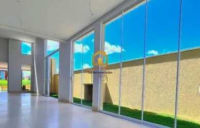 Imagem: A casa possui 4 Dormitórios, 5 Banheiros, 2 Vagas na garagem