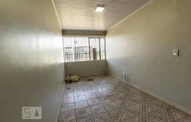 Imagem: A casa possui 2 Dormitórios, 1 Banheiro, 1 Vaga na garagem