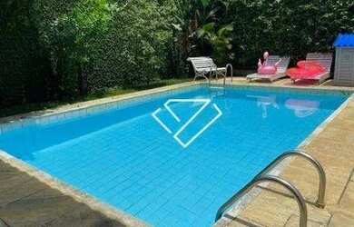 Imagem: A casa em condomínio possui 4 Dormitórios, 5 Banheiros, 370m²