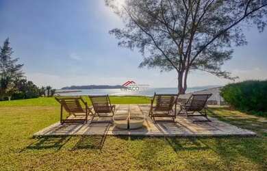 Imagem: A casa possui 5 Dormitórios, 5 Banheiros, 5 Vagas na garagem