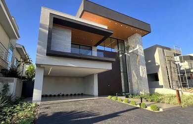 Imagem: A casa em condomínio possui 4 Dormitórios, 5 Banheiros, 4