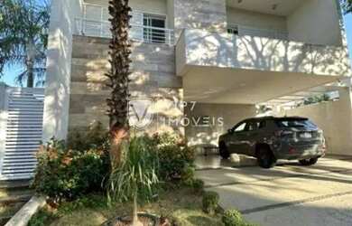 Imagem: A casa em condomínio possui 4 Dormitórios, 5 Banheiros, 4