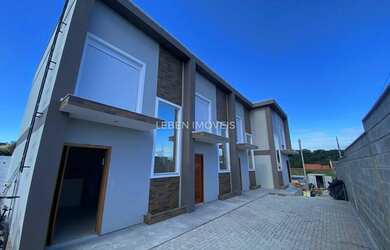 Imagem: A casa possui 2 Dormitórios, 1 Banheiro, 1 Vaga na garagem