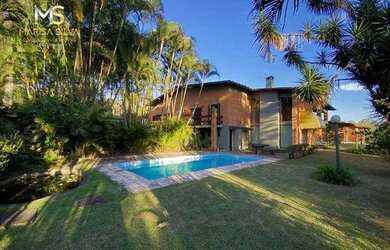 Imagem: A casa em condomínio possui 4 Dormitórios, 5 Banheiros, 5