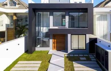 Imagem: A casa em condomínio possui 5 Dormitórios, 5 Banheiros, 390m²