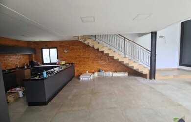 Imagem: A casa em condomínio possui 3 Dormitórios, 5 Banheiros, 4