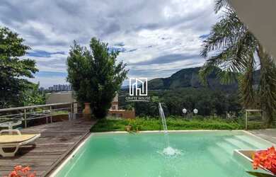 Imagem: A casa em condomínio possui 4 Dormitórios, 5 Banheiros, 4