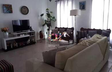 Imagem: A casa possui 3 Dormitórios, 3 Banheiros, 3 Vagas na garagem