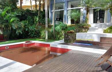 Imagem: A casa em condomínio possui 4 Dormitórios, 4 Banheiros, 5