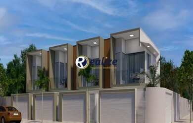 Imagem: A casa possui 3 Dormitórios, 2 Banheiros, 2 Vagas na garagem