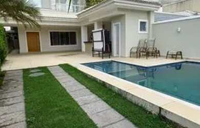 Imagem: A casa em condomínio à venda possui 4 Dormitórios, 4 Banheiros