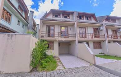 Imagem: A casa em condomínio possui 3 Dormitórios, 3 Banheiros, 2